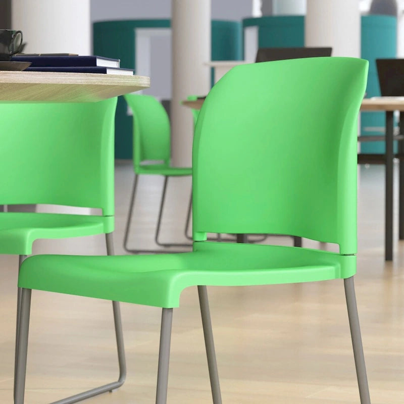 Chaise empilable en polypropylène orange/noir/bourgogne/marine/jaune/gris/bleu/vert avec piétement luge en acier thermolaqué – Unité