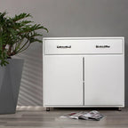 Buffet en MDF gris/blanc avec 3 tiroirs, 3 portes et pieds en tube d'acier – Individuel